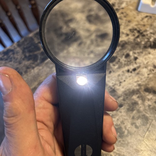 Handheld magnifying glass - magnifying,